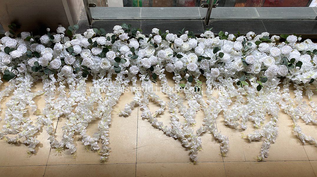 white flower wedding arch