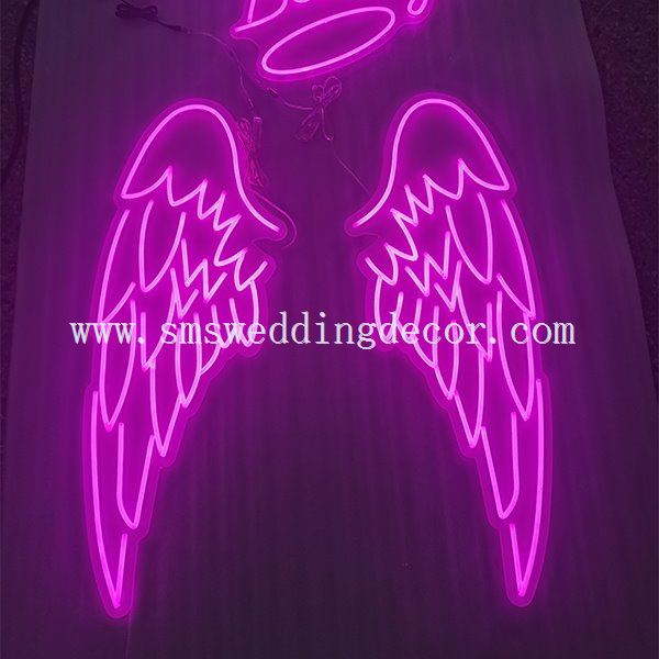 neon sign angel wings